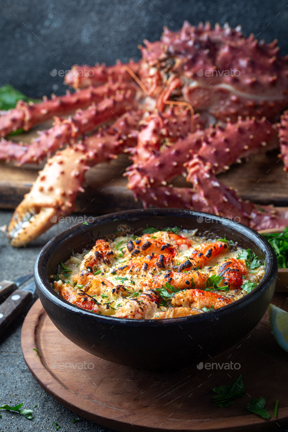 Chilean food. Baked crabmeat crab meat with cheese, cream and bread - Stock Photo - Images