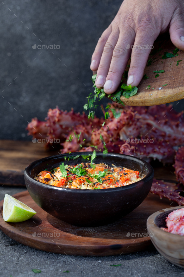 Chilean food. Baked crabmeat crab meat with cheese, cream and bread. Pastel o chupe de sentolla or - Stock Photo - Images
