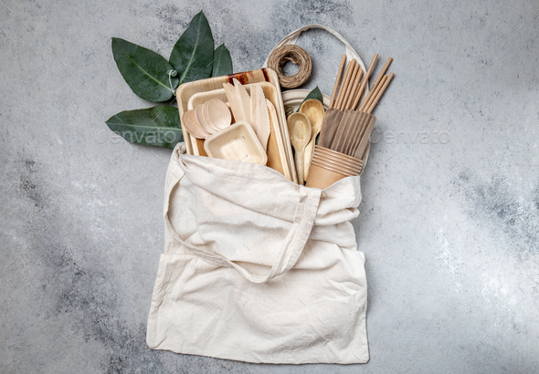 Eco craft paper and wooden tableware - Stock Photo - Images