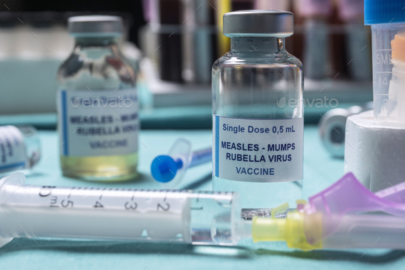Different vials of triple viral vaccine of measles, rubella and mumps - Stock Photo - Images