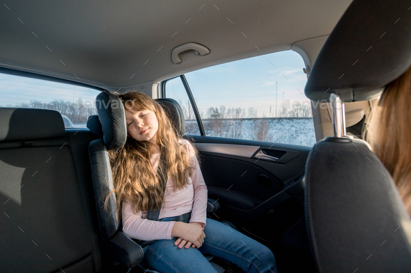 Sleeping Little Girl In Child Car Seat During Long Journey Stock Photo By Leszekglasner Sleeping Little Girl In Child Car Seat, How Long Baby In Car Seat Journeys