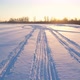 Snowmobile tracks and sunset - VideoHive Item for Sale
