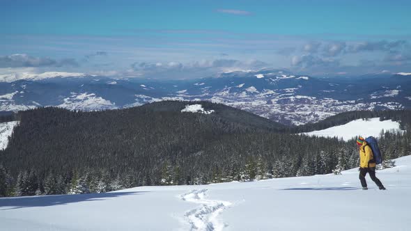 Man Backpacker Tourist Walking Snow Landscape alt