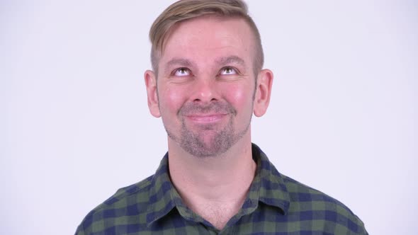 Portrait of Blonde Hipster Man Looking Bored alt