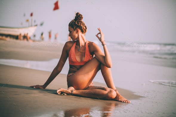 Beautiful Young Woman In Bikini Practice Yoga Meditation Stock
