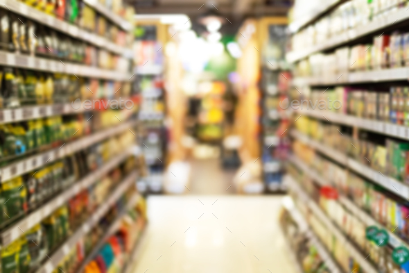Grocery Store Aisle Abstract Blurred Background With Products On Shelves  Stock Photo by Prostock-studio