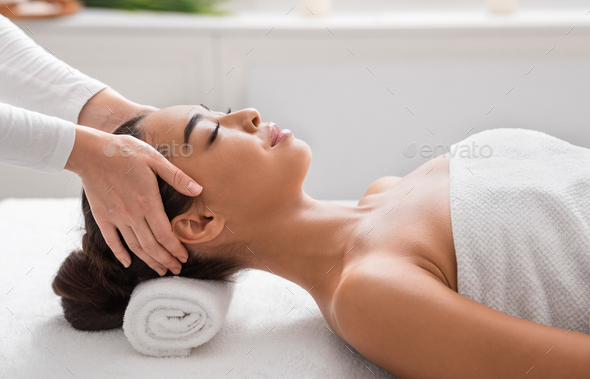 Relaxed Asian Lady Getting Head Massage In Spa Salon Enjoying Beauty
