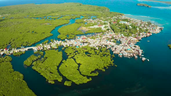 Aerial View The Town Is in Mangroves. Siargao,Philippines. alt