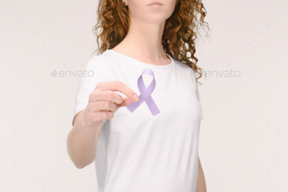 cropped shot of woman showing purple awareness ribbon for general cancer awareness, Lupus awareness,