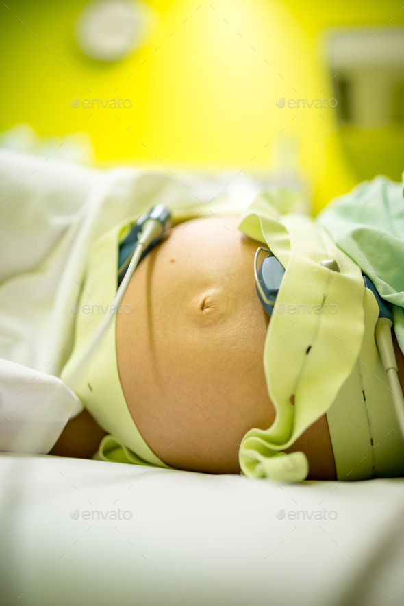 Pregnant woman undergoing prenatal tests - Stock Photo - Images