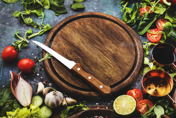 Vegetables And Greens With Wooden Cutting Board. Healthy Food Background  Stock Photo, Picture and Royalty Free Image. Image 80150842.