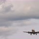 Airplane Approaching Cloudy Sky - VideoHive Item for Sale