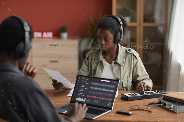 Two Musicians Composing Music in Studio - Stock Photo - Images