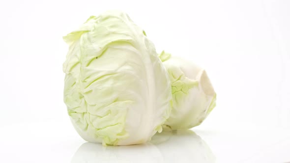 Haft Cabbage and cabbage rotation isolated on white background, Close up.