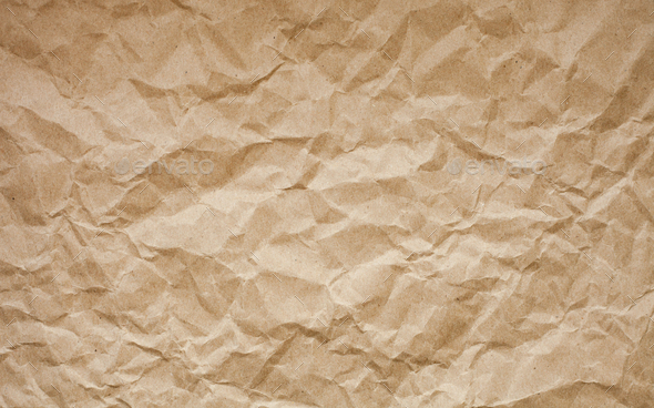 Brown crumpled paper background. Old paper texture. Ancient page pattern.  Stock Photo by blazhulia