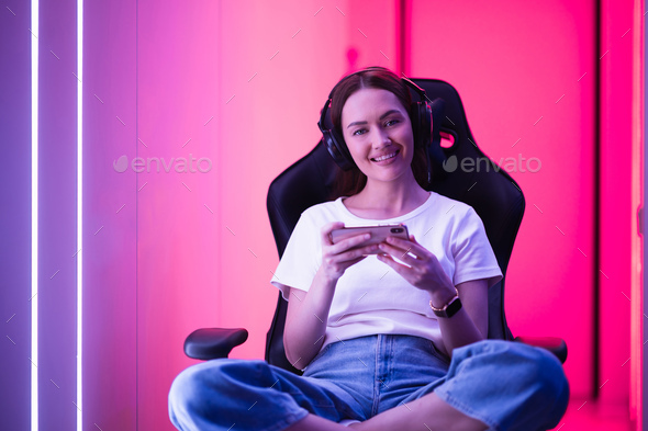 Sexy Young Woman Sitting in Gaming Club and Playing Online Game, People  Stock Footage ft. body & clothes - Envato Elements