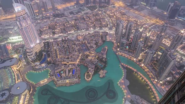 Dubai Downtown Day to Night Transition with City Lights From Above Timelapse alt