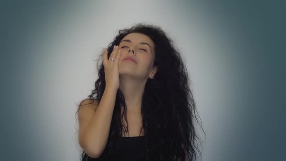 Curly Brunette Woman Feels Stress alt