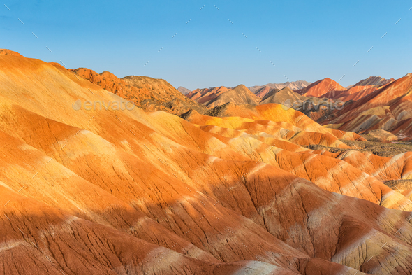 rainbow mountain in sunset on zhangye - Stock Photo - Images