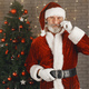 Man in santa claus costume looking at the camera - PhotoDune Item for Sale