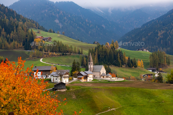 Santa Maddalena church, Dolomites mountains in magic autumn colors