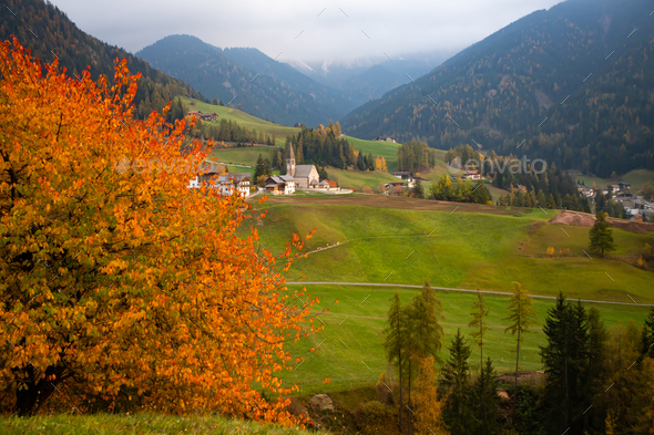 Santa Maddalena church, Dolomites mountains in magic autumn colors