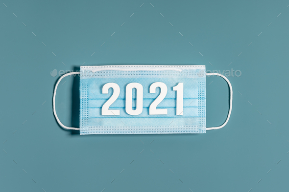Surgical mask with number 2021. Typical 3-ply surgical mask to cover the mouth and nose.
