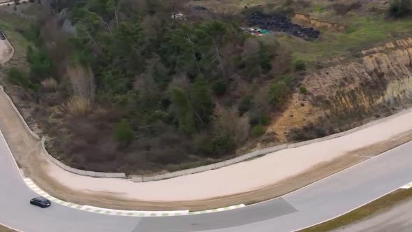 sports cars on a circuit day alt