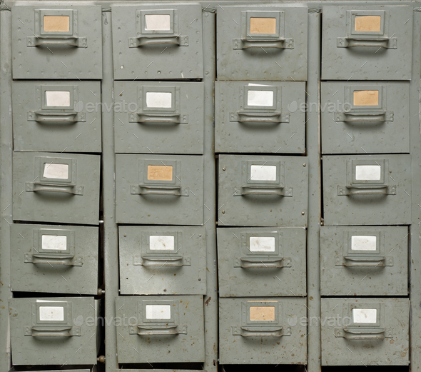 Old gray metal cabinet with drawers - Stock Photo - Images