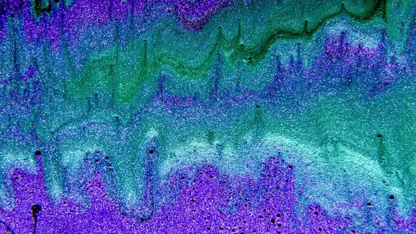 Abstract Paint Mixing Neon Blue Green and Violet Purple Colors Ink