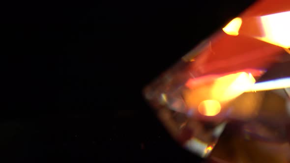 Diamond Edge Glows with Bright Multicolored Highlights. Black Background alt
