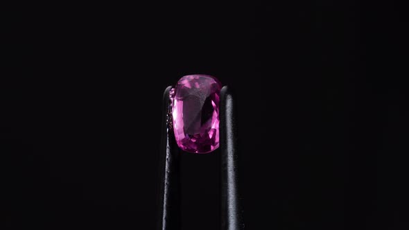 Natural Pink Spinel Gem Stone on the Turning Table alt