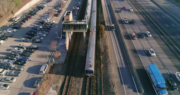 A commuter train leaving the Goldens Bridge station  alt