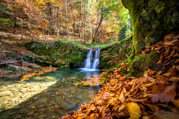 Beautiful Waterfall At The Mountain In Autumn Landscape Stock Photo By Leszekglasner