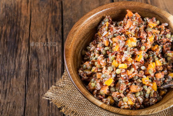 Red rice, lentils and butternut squash with carrot and quinoa in