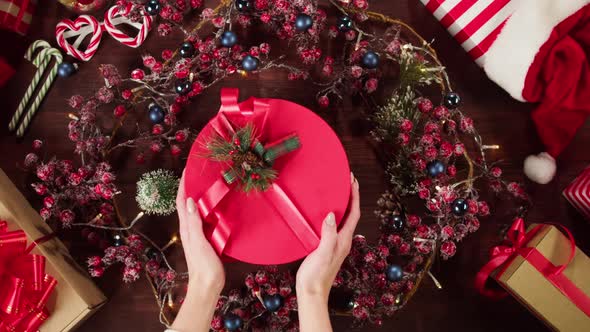 Present Box in Christmas Wreath Top View alt