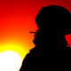 Silhouette of smoking on sunset army soldier - PhotoDune Item for Sale