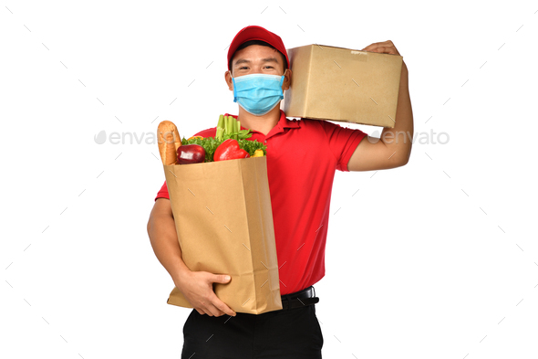 Grocery delivery courier man in red uniform and medical gloves