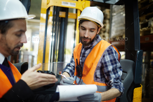 Teamwork of warehouse managers - Stock Photo - Images
