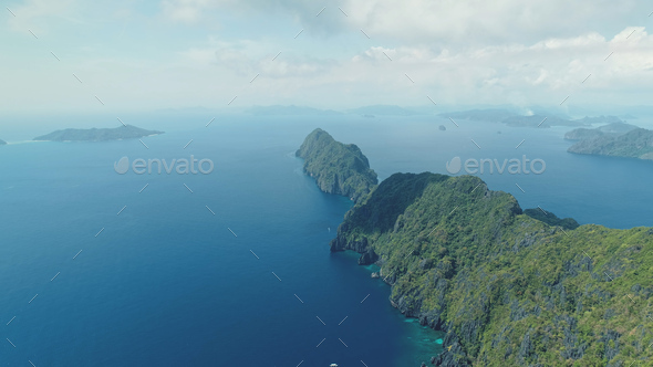 Asia mountainous isle with exotic nature variety scape. Tropical highland island aerial view