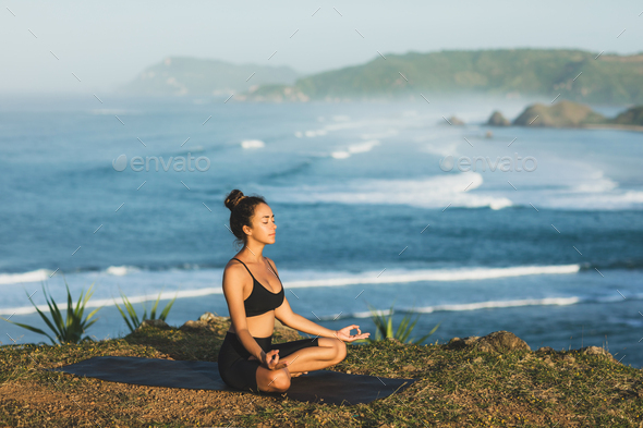 Yoga woman in lotus pose on nature background. Vector illustration
