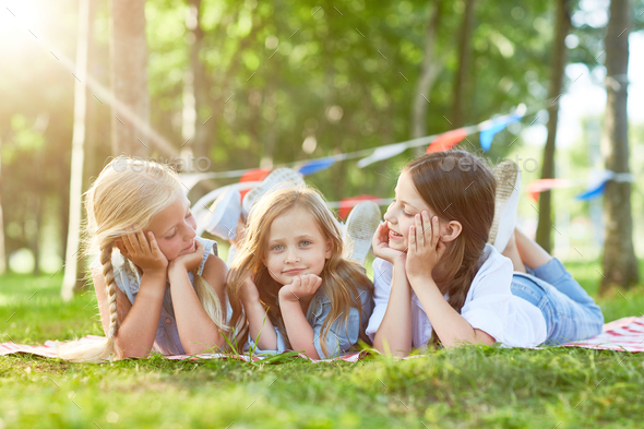 Girls in park Stock Photo by Pressmaster | PhotoDune