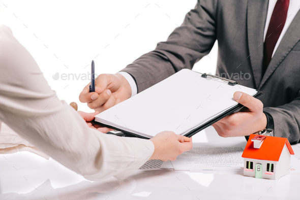 cropped view of mortgage broker and woman making deal isolated on white, mortgage concept - Stock Photo - Images
