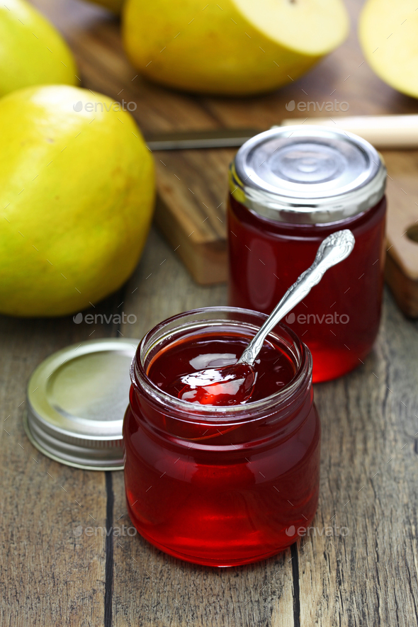 homemade quince jelly in glass jars