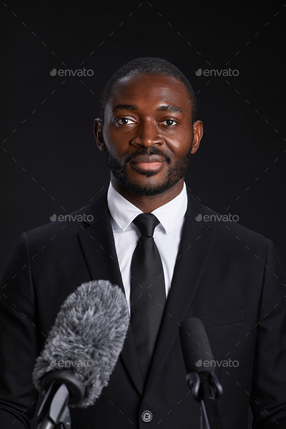 Confident African-American Man at Podium