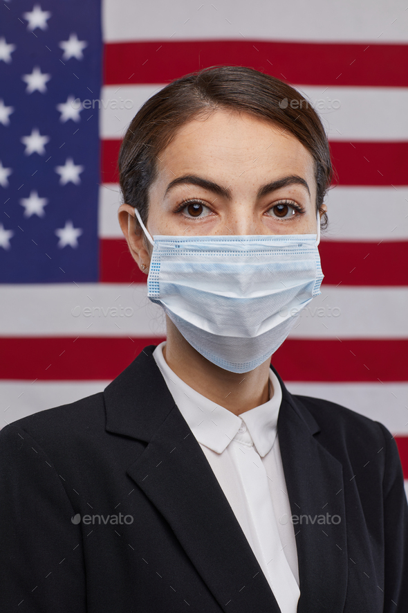 Successful Woman Wearing Mask against American Flag