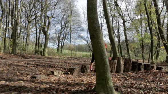 Woman Stretching in Clear Wood alt