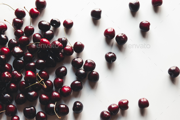 Fresh ripe cherry on the white wooden background. Top view, copy space - Stock Photo - Images