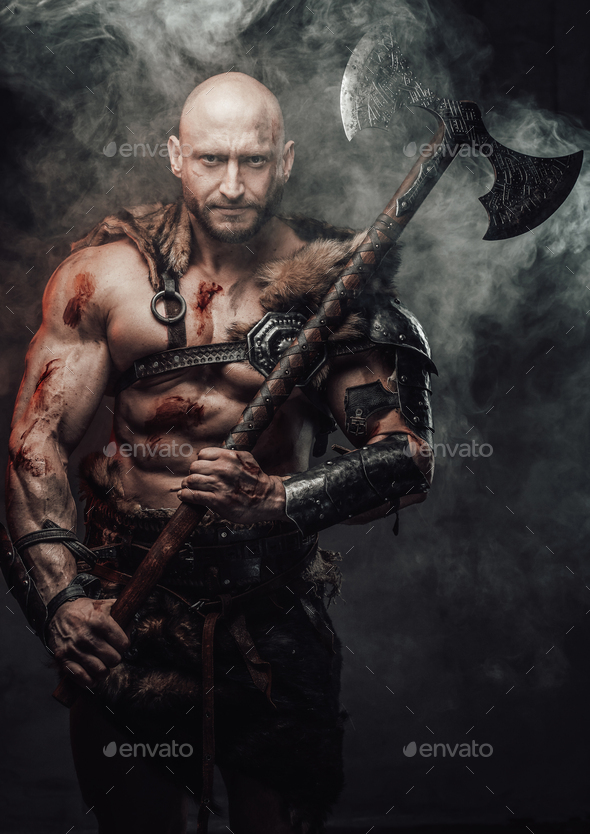 Armed with two handed axe dangerous bald viking warrior Stock Photo by ...