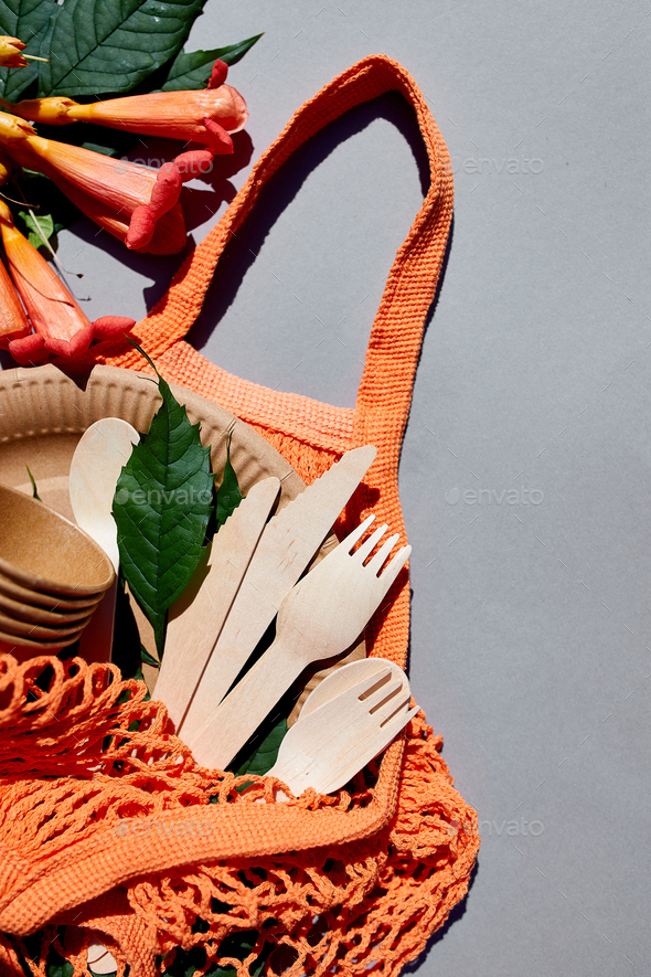 Flat lay of eco craft paper and wooden tableware, Zero waste